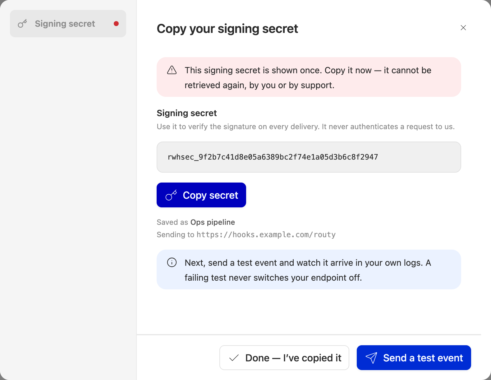 The signing secret, shown once, with a copy button and a Send a test event action